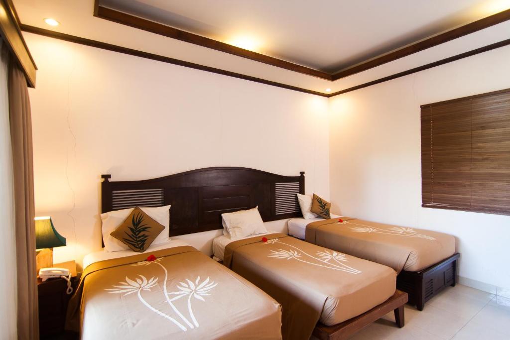 เดอ มูนุต บาหลีนีส รีสอร์ต Hotel อูบุด ภายนอก รูปภาพ