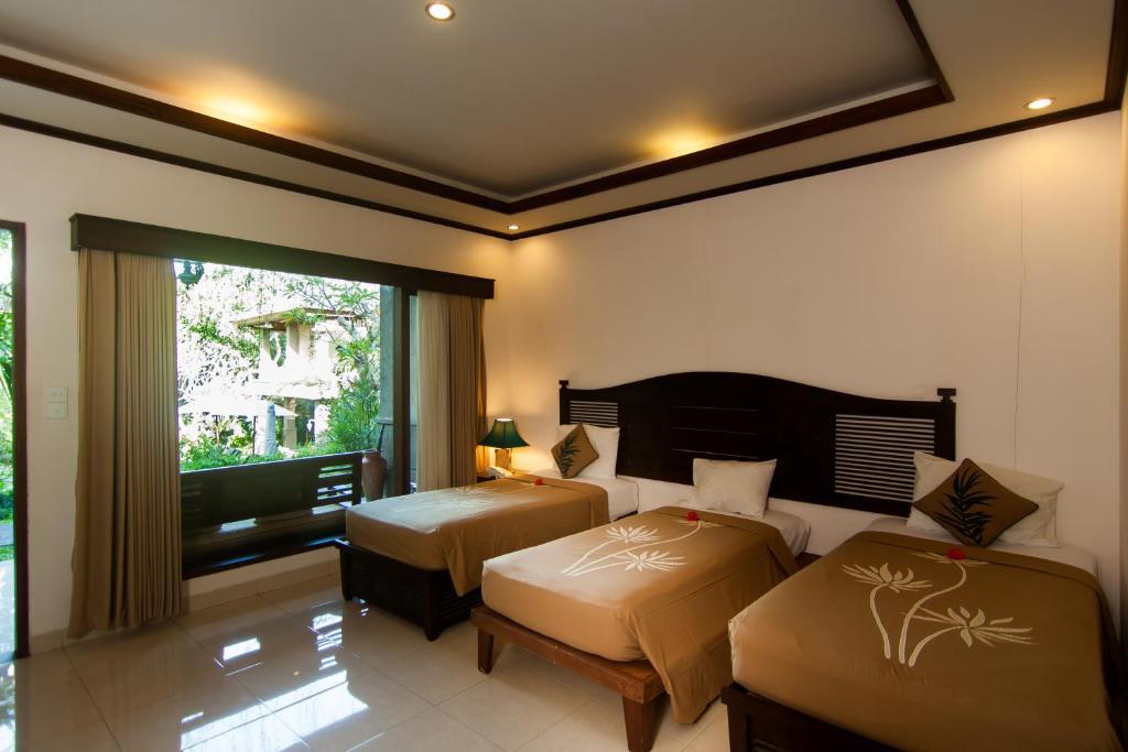 เดอ มูนุต บาหลีนีส รีสอร์ต Hotel อูบุด ภายนอก รูปภาพ