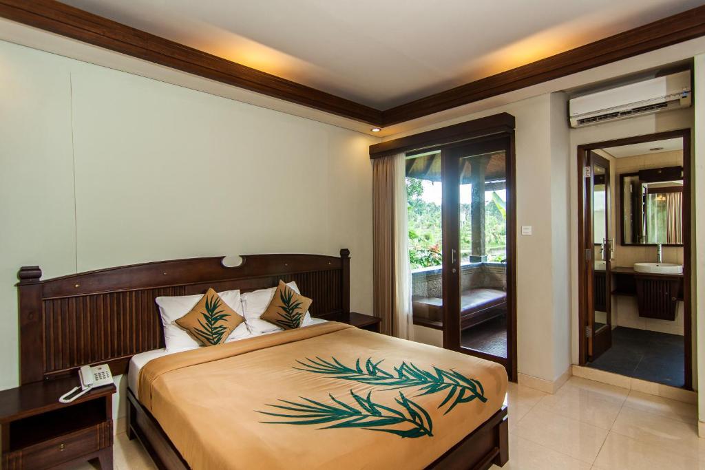 เดอ มูนุต บาหลีนีส รีสอร์ต Hotel อูบุด ภายนอก รูปภาพ