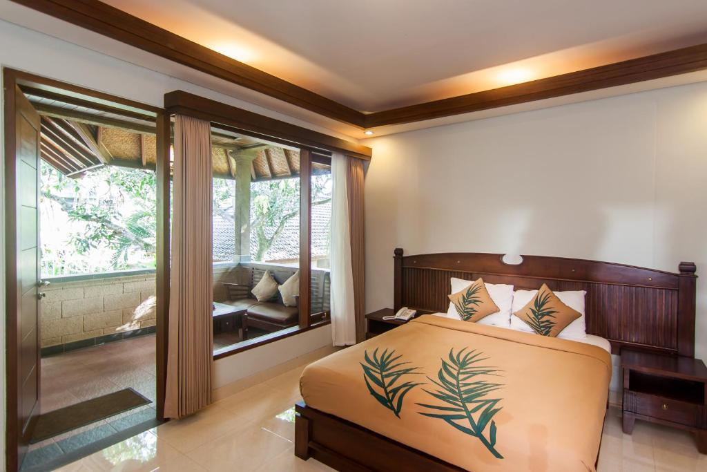 เดอ มูนุต บาหลีนีส รีสอร์ต Hotel อูบุด ภายนอก รูปภาพ