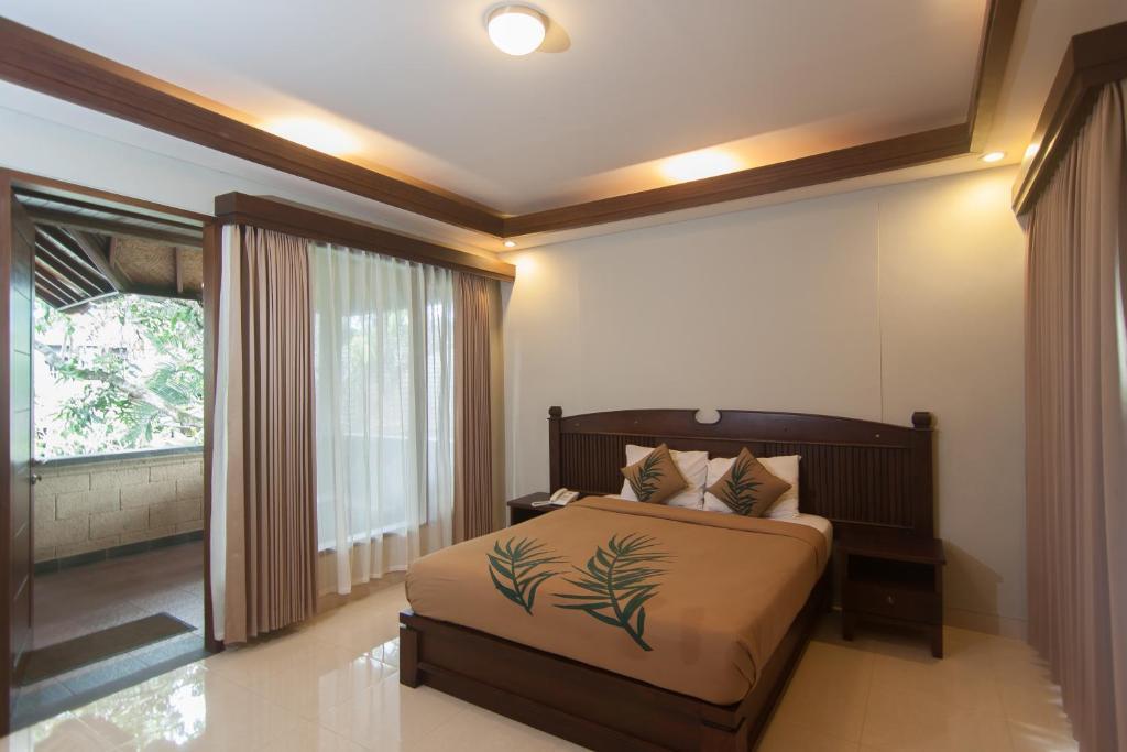 เดอ มูนุต บาหลีนีส รีสอร์ต Hotel อูบุด ภายนอก รูปภาพ